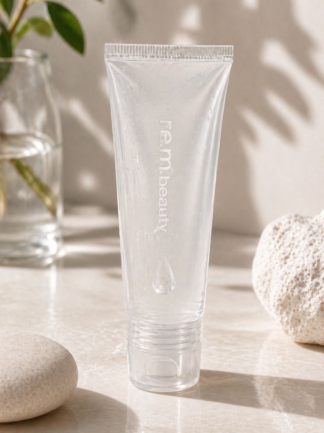 r.e.m. beauty Utmost Importance Plumping Lip Gloss - Clear